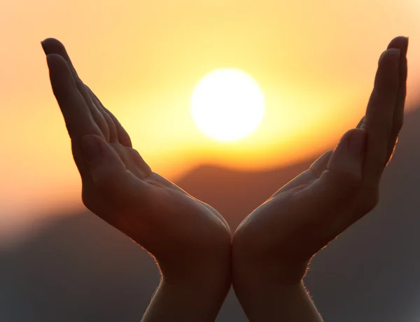 Sunset in hands — Stock Photo, Image
