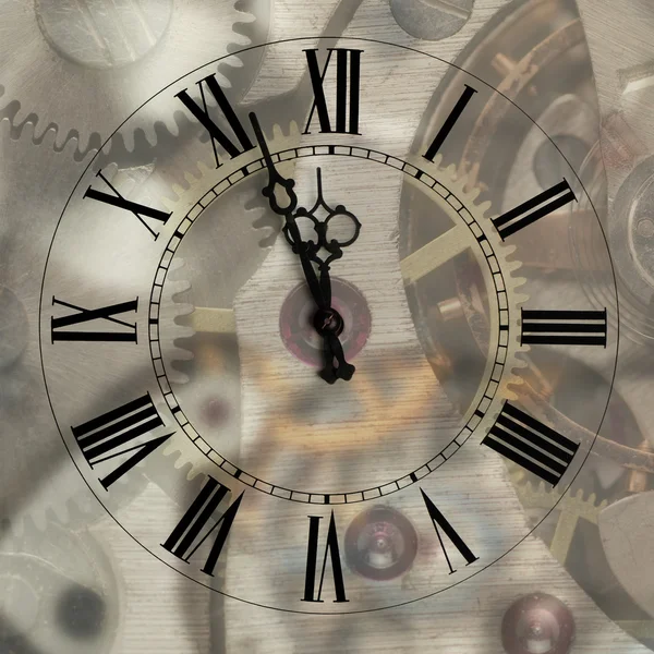 Oude uur met dacht pijlen op mechanisme wazig achtergrond — Stockfoto