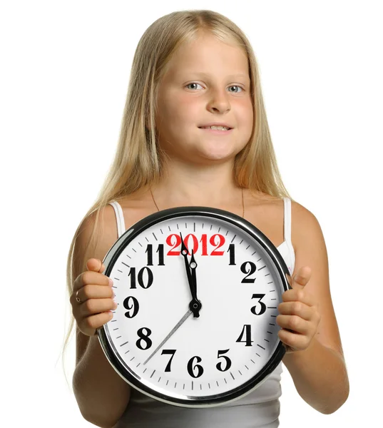 La fille tient dans les mains une grande horloge avec des chiffres 2012 — Photo