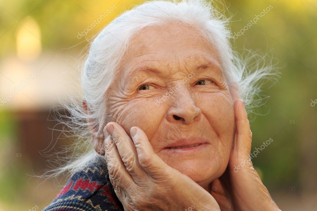 Portrait of the elderly woman Stock Photo by ©galdzer 6992322