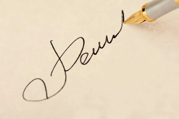 The signature close up and fountain pen. Old yellow paper — Stock Photo, Image