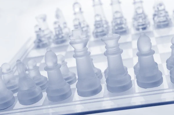 Glass chess. The first move. — Stock Photo, Image