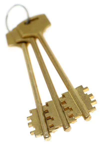Three gold keys — Stockfoto