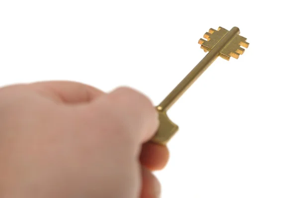 Nyckel i en hand — Stockfoto