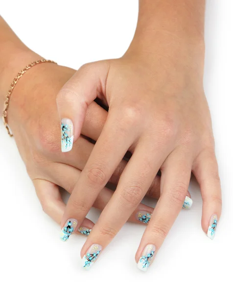 Vrouwelijke handen met manicure close-up. tekening van een bijkantoor met bl — Stockfoto