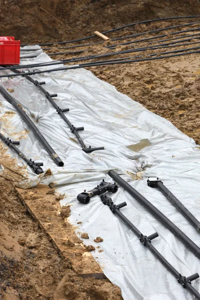 Preparação para instalação de tubos de calor geotérmico no gro — Fotografia de Stock