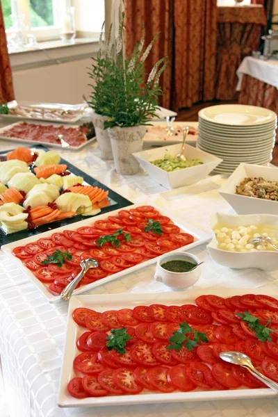 Buffet with tomato and fruit — Zdjęcie stockowe