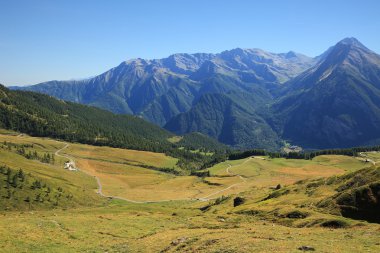 Valley among mountains in northern Italy. clipart