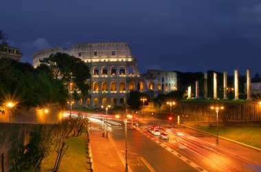 Coliseum at night in Rome, Italy. clipart