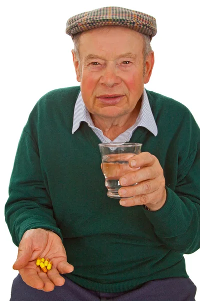 Uomo anziano che prende medicina — Foto Stock