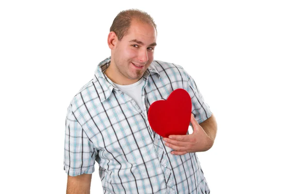 Νεαρός άνδρας κρατώντας κόκκινη καρδιά — Φωτογραφία Αρχείου