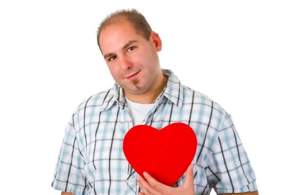 Молодой человек с красным сердцем — стоковое фото