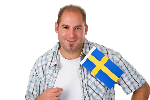 Jonge man bedrijf Zweedse vlag — Stockfoto