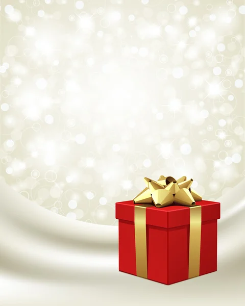 Cadeau rouge avec arc en or sur soie — Image vectorielle
