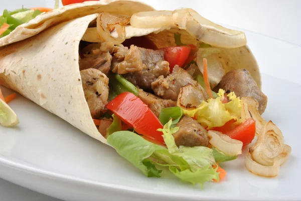 stock image Wrap with grilled pork and some vegetable