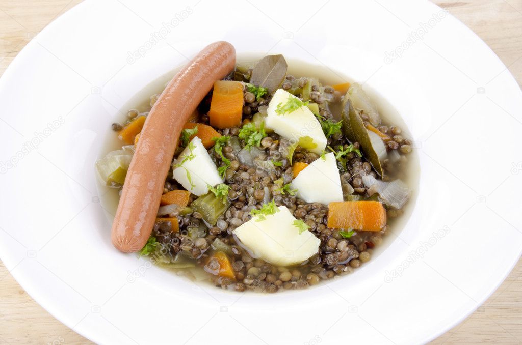 Lentil soup with sausages and boiled potatoes