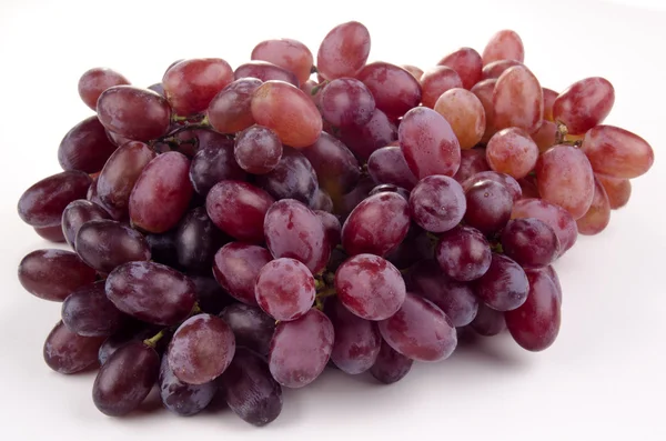 Vers geplukt rode druiven van de wijnstok werf — Stockfoto