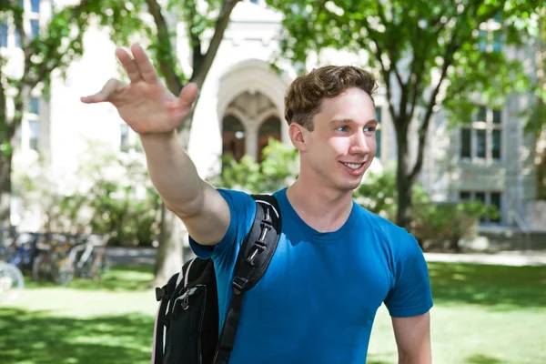Smiling University Student Waving — Stock Photo, Image