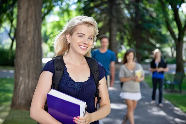 Happy young college girl — Stock Photo, Image