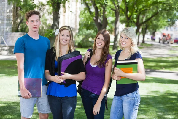 College students on campus Royalty Free Stock Photos