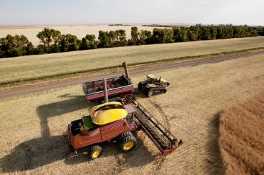 Harvester with Grain Cart clipart