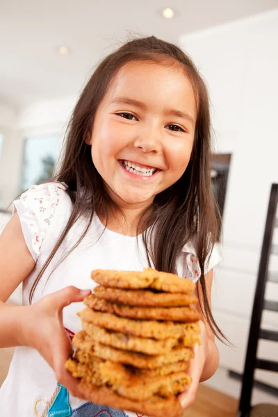 Happy Cute Girl Holding Cookies — Stock Photo, Image