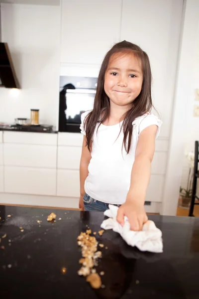 Happy Young Girl Wiping Counter — Stock Photo, Image