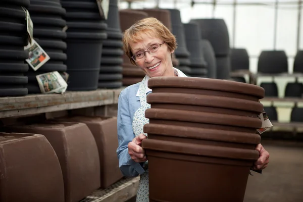 Senior With Plant Pots — Stock Photo, Image