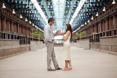 Handsome Man Talking To Beautiful Woman clipart