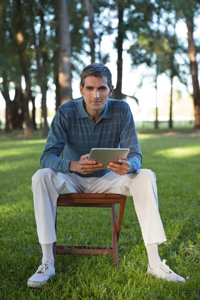 Casual Man Holding Tablet PC — Stock Photo, Image
