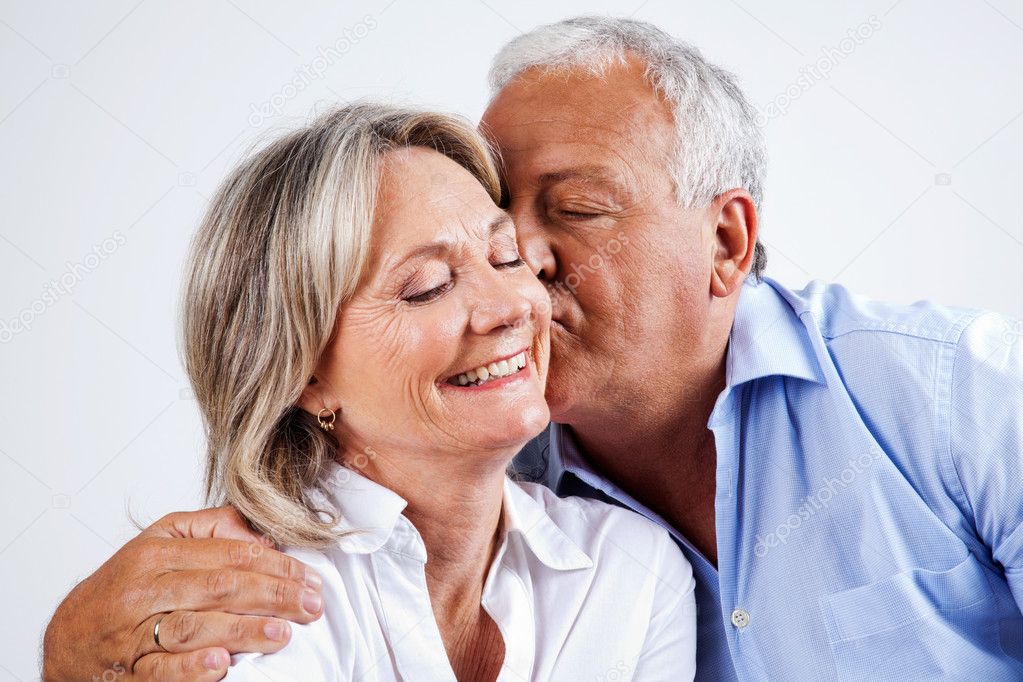 Husband Kissing Wife on Cheek