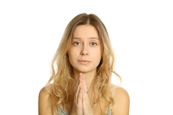 Молодая женщина молится — стоковое фото