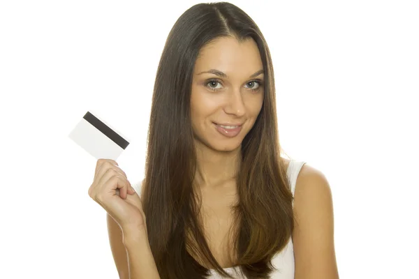 Mulher jovem segurando cartão de crédito — Fotografia de Stock