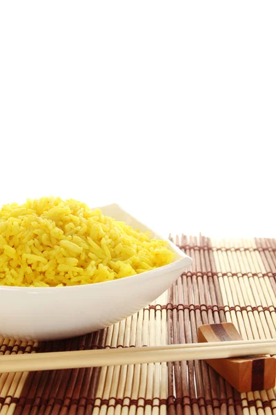 Plaat van rijst en hout stokken — Stockfoto