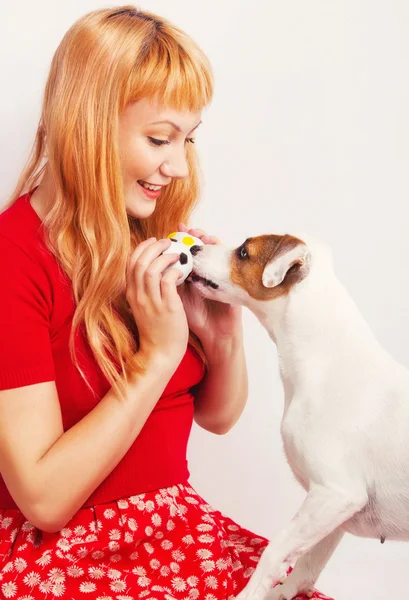 Redhead with a jack russell terrier — Stock Photo, Image