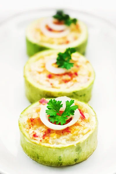 Zucchini stuffed with cheese and vegetables — Stock Photo, Image