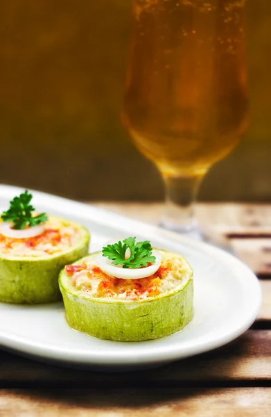 Zucchini stuffed with cheese and vegetables — Stock Photo, Image