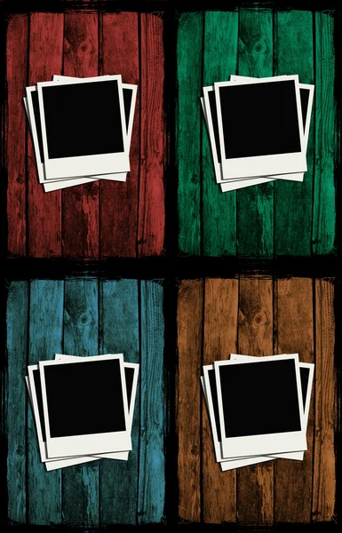 Polaroids sobre paredes de madeira grunge coloridas — Fotografia de Stock