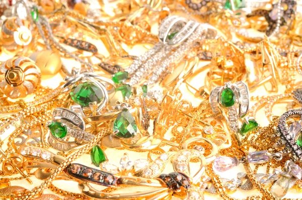 Zlaté šperky pozadí — Stock fotografie