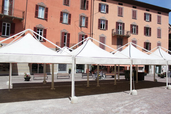 Tent in the center square for market