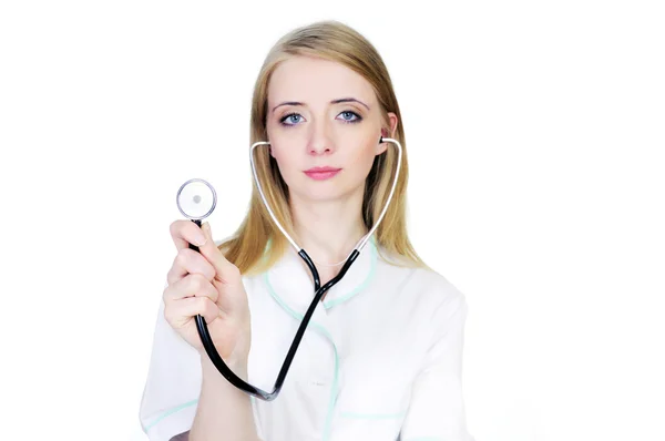 Doctor in white coat using stethoscope — Stock Photo, Image