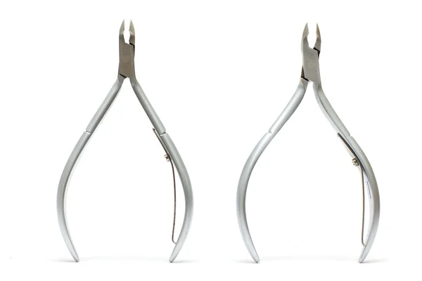 Dois cortadores de unhas isolados em branco — Fotografia de Stock