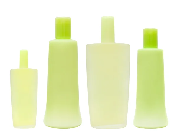 Botol kosmetik hijau kelompok yang bersih terisolasi — Stok Foto