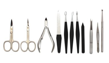 Manicure or pedicure equipment on white clipart