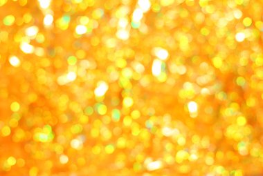 Christmas glittering background. Golden bokeh - abstract texture