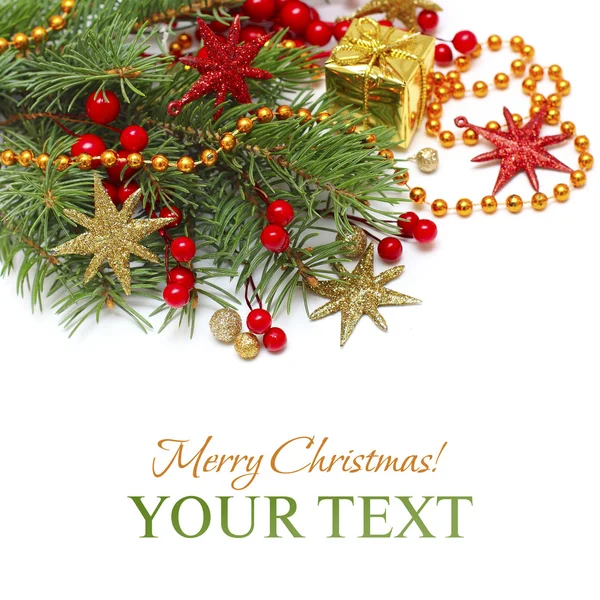 Vánoční pozadí - Vánoční dekorace, zelené větve, červené hvězdy — Stock fotografie