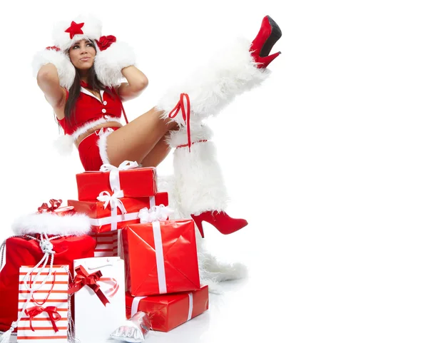 Chica de Navidad con regalos Imagen de stock