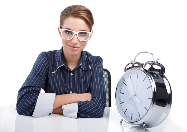 Bored woman at her desk at the end of the day — Stock Photo, Image