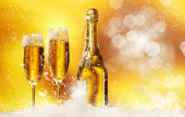 New Year champagne in the snow — Stok fotoğraf