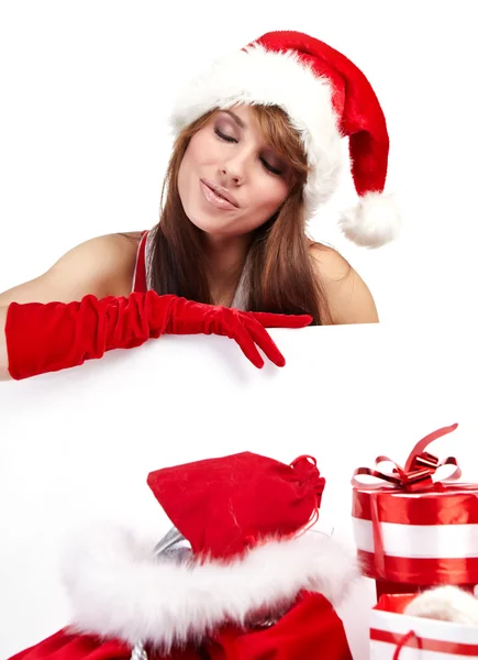 산타 모자 빈 보드를 들고 있는 아름 다운 크리스마스 여자 — 스톡 사진